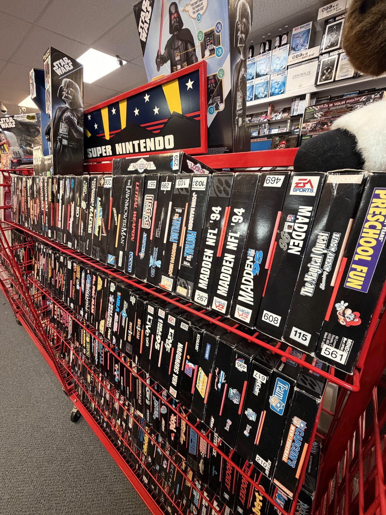 Rows of vintage video-game boxes inside the last remaining Video Station in Taylor, Texas